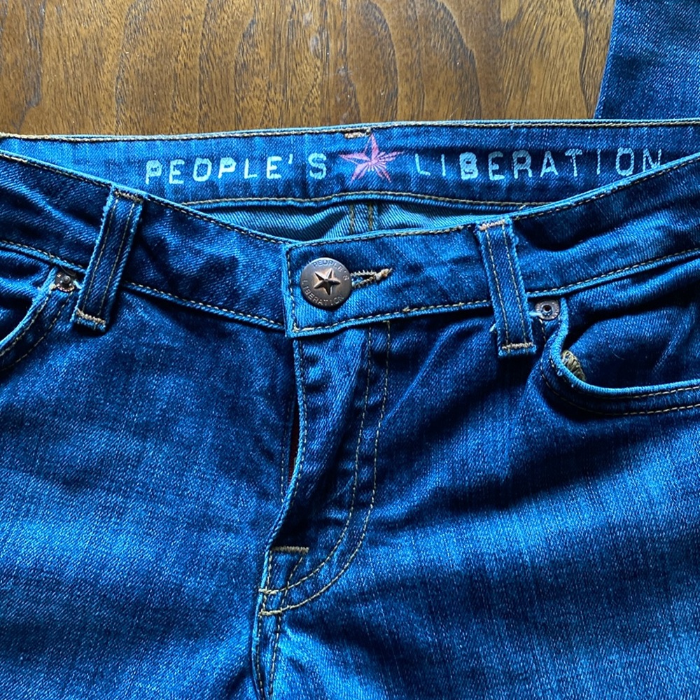 People liberation blue jeans, size 28 made in the USA stars on pockets